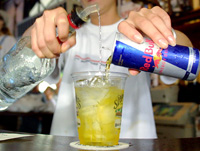 Vodka and Red Bull being poured